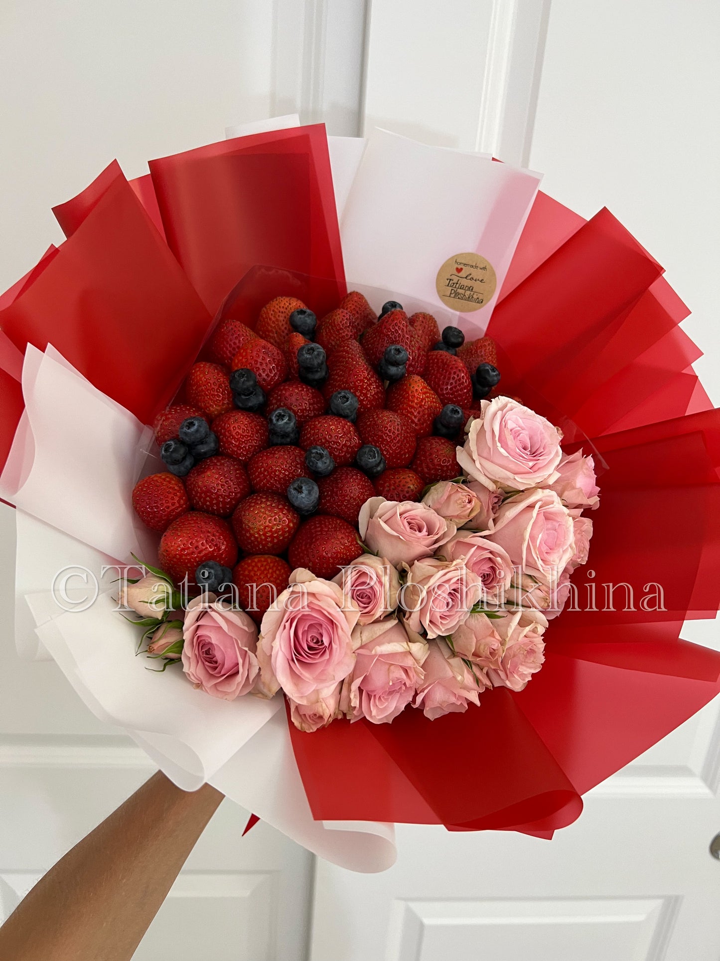 Berrys and fresh roses bouquet