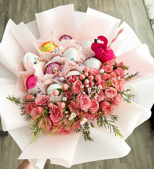 kinder chocolate and fresh spray roses bouquet.