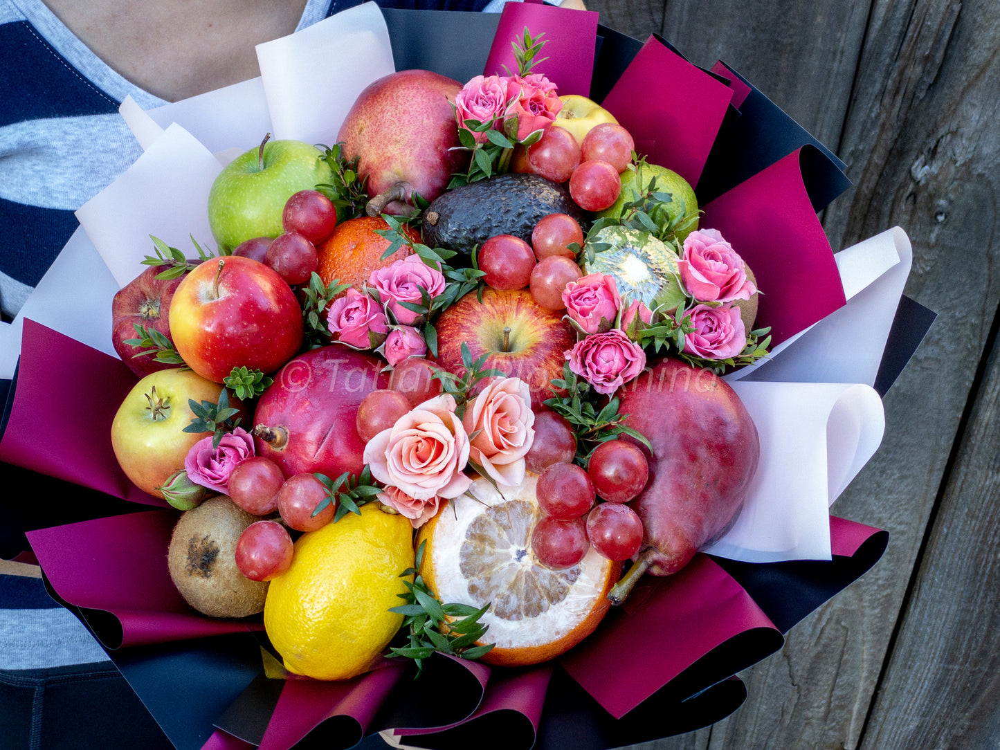 Seasonal fruits and fresh spray rose