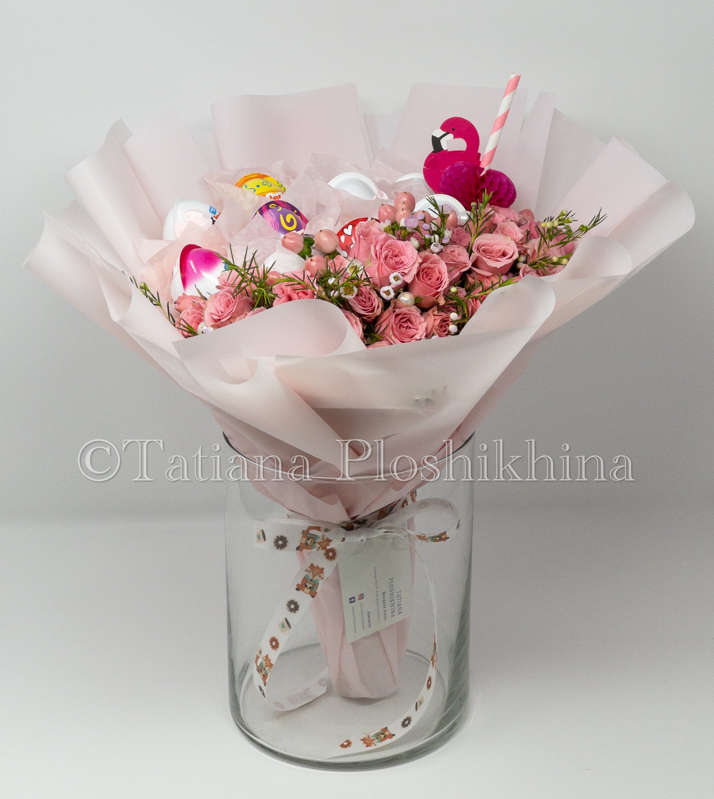 kinder chocolate and fresh spray roses bouquet.