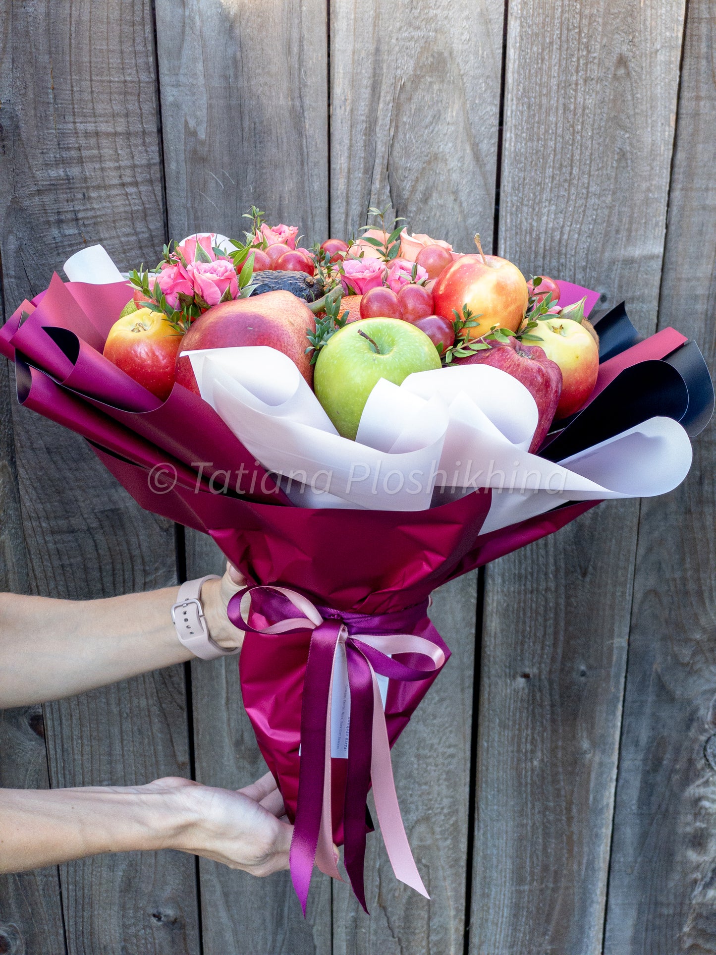 Seasonal fruits and fresh spray rose