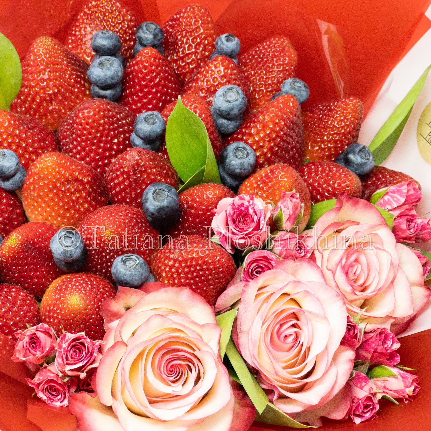 Berrys and fresh roses bouquet