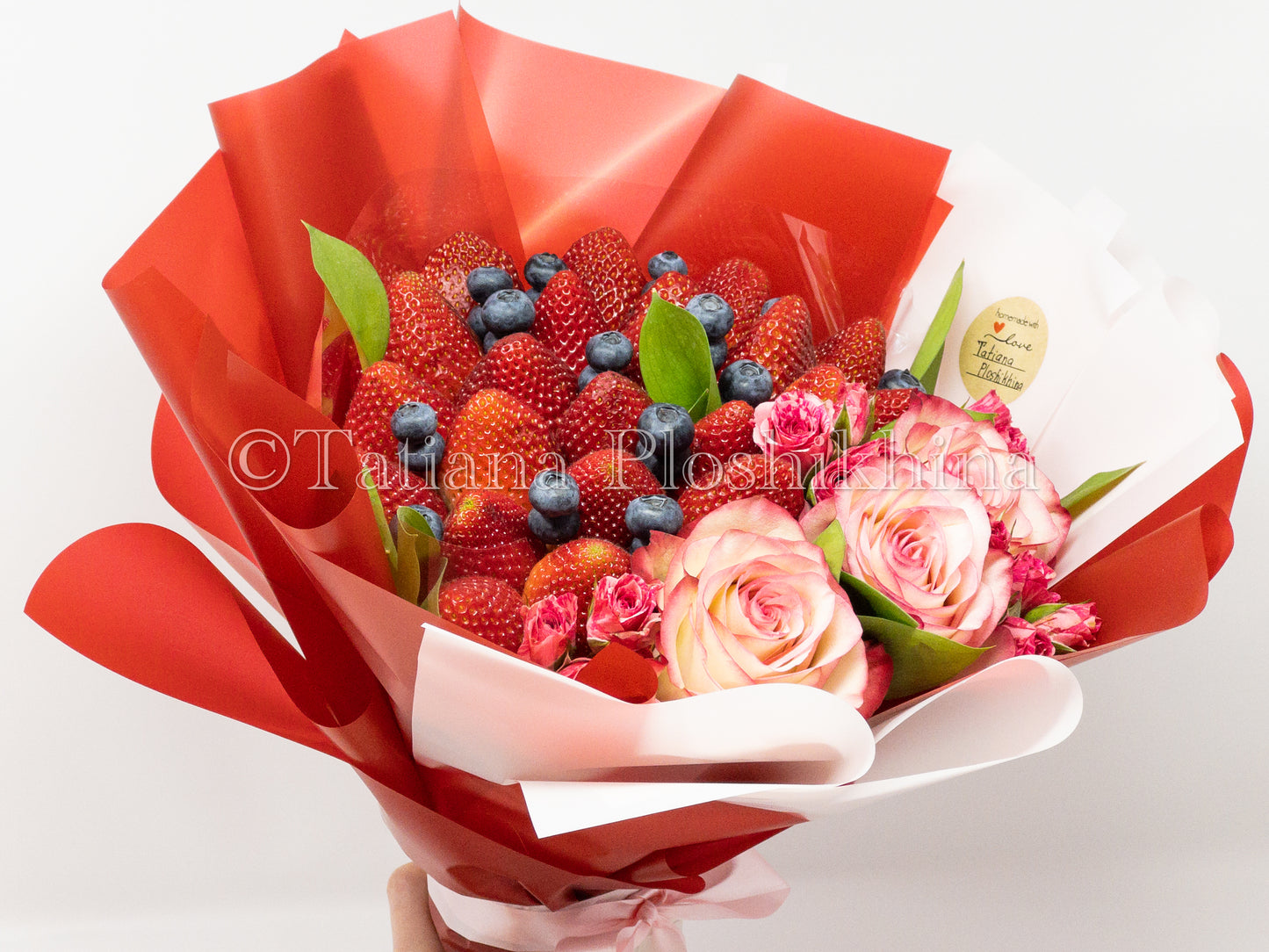 Berrys and fresh roses bouquet